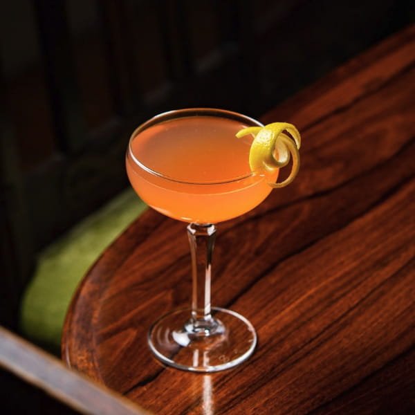 Cocktail bar display at Cafe Kitty featuring drinks and beverage selection