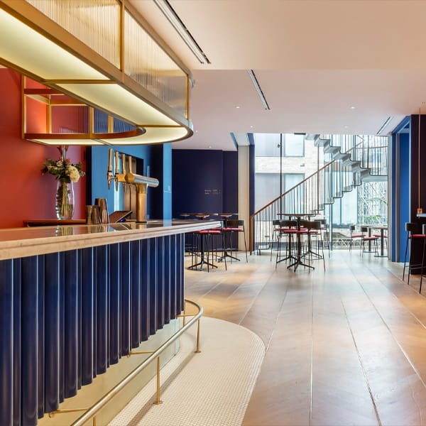Cafe Kitty interior seating area with sophisticated dining ambiance in Soho