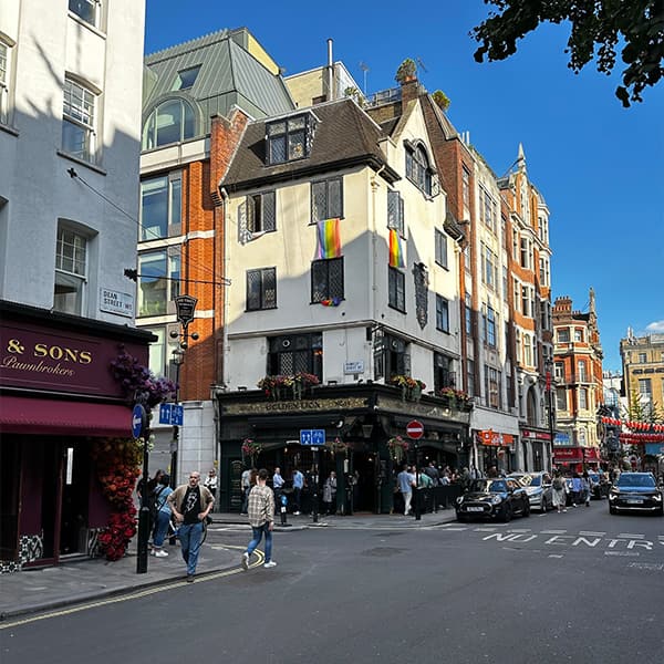 Soho's elegant streetscape Cobblestone streets and historic facades of luxury Soho district in London
