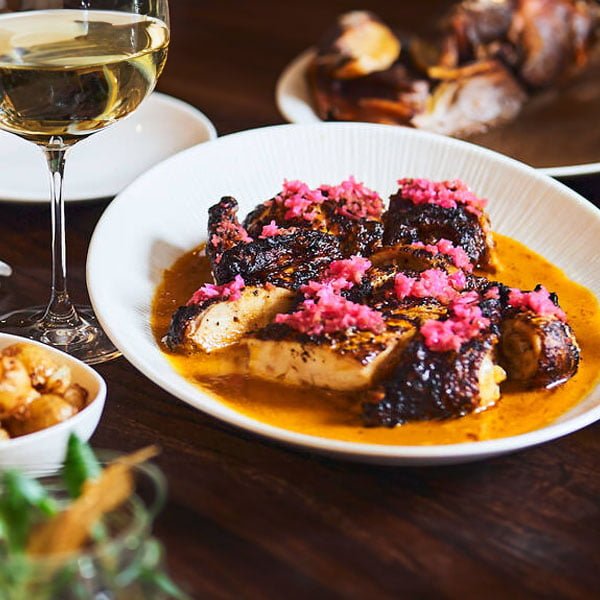 Soho's culinary heart Soho's vibrant street scene with neon signs and bustling dining establishments