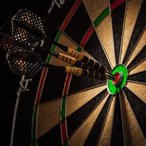 Professional darts competition PDC darts match at the O2 arena with players competing on stage