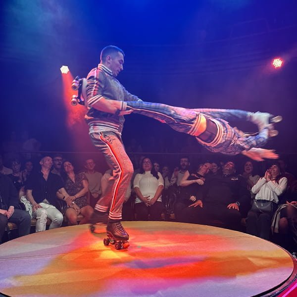 Acrobatic performer executing dynamic movement in Sophie's Surprise 29th production