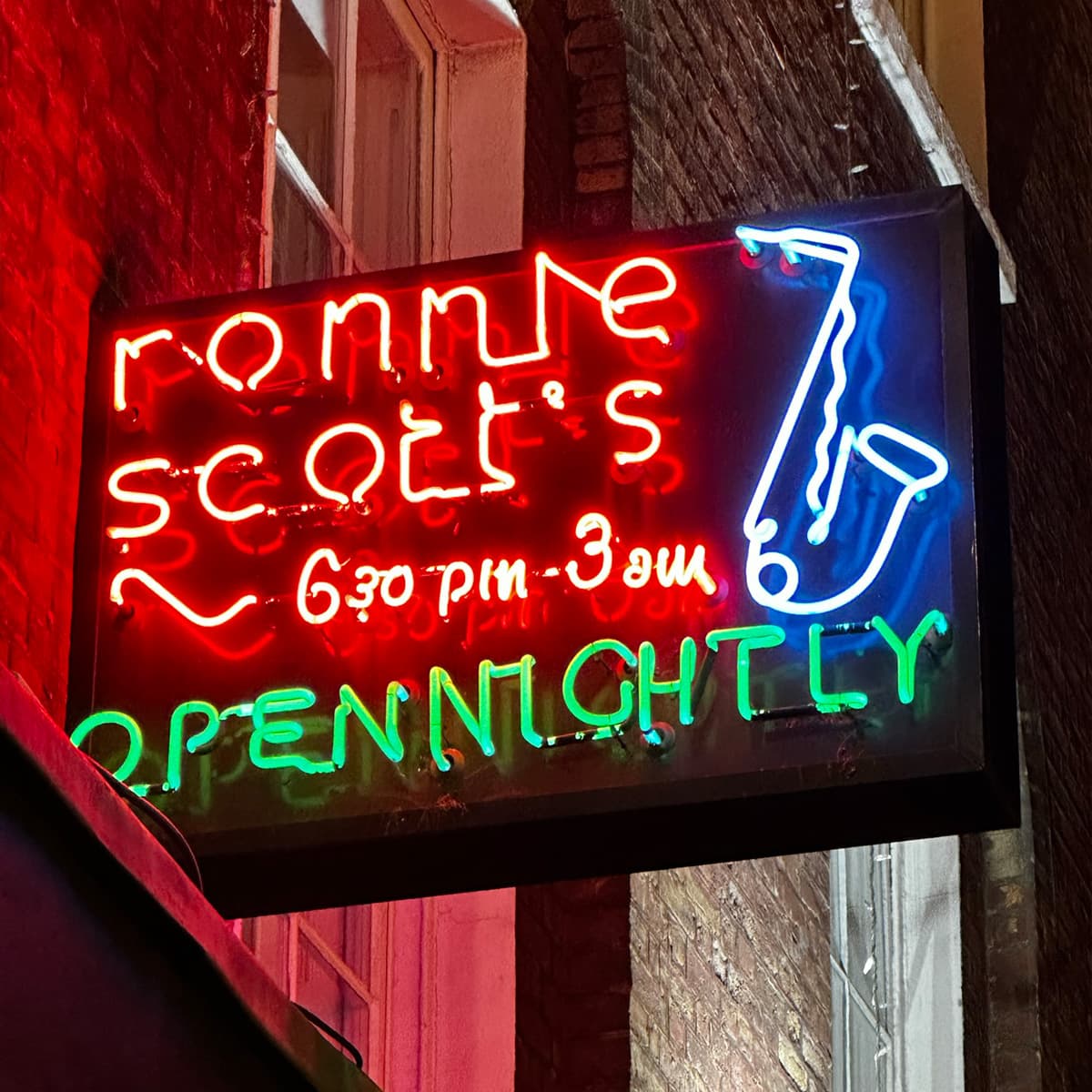 Iconic Soho jazz venue Ronnie Scott's jazz club interior with stage lighting and intimate seating in Soho