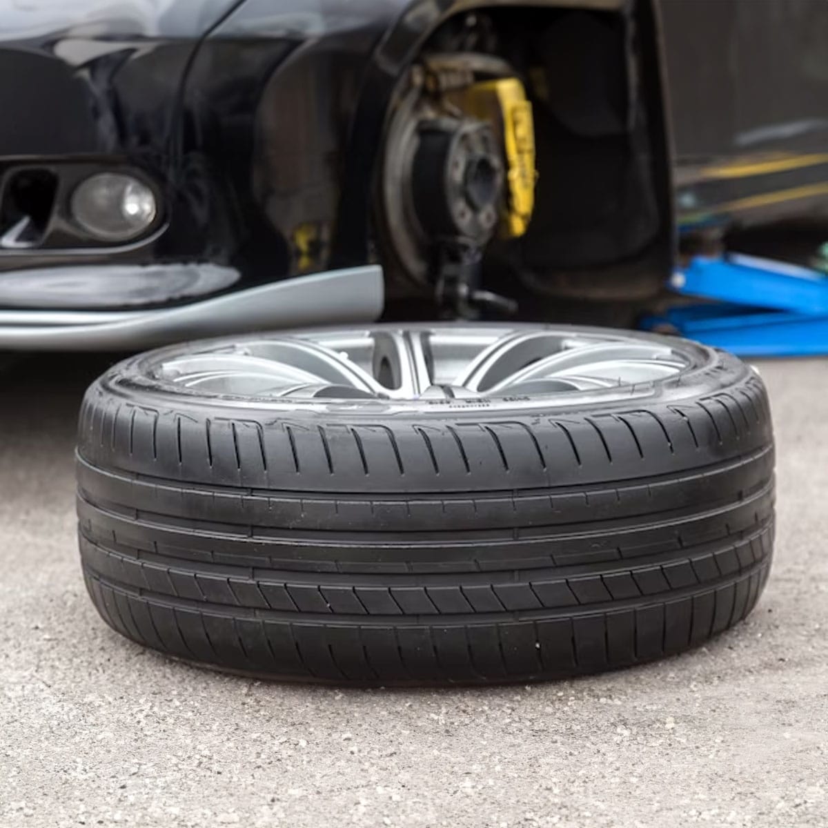 Weather-specific tyre options Selection of different car tyres displayed showing various tread patterns and designs