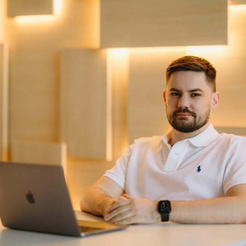 Security professional analysing fraud detection data on computer screen