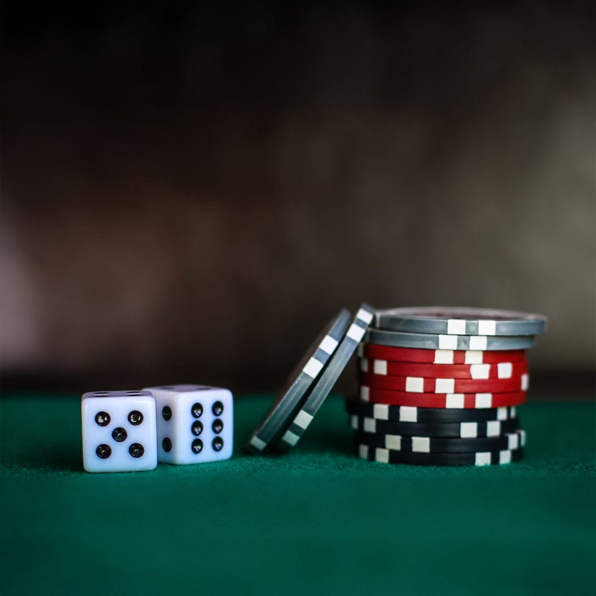 Person enjoying responsible gambling entertainment whilst maintaining balance with other life activities