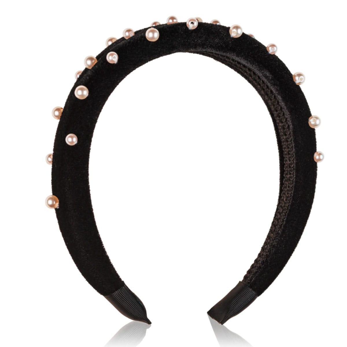 Chunky barrette and oversized clips creating modern drama on sleek straight hair