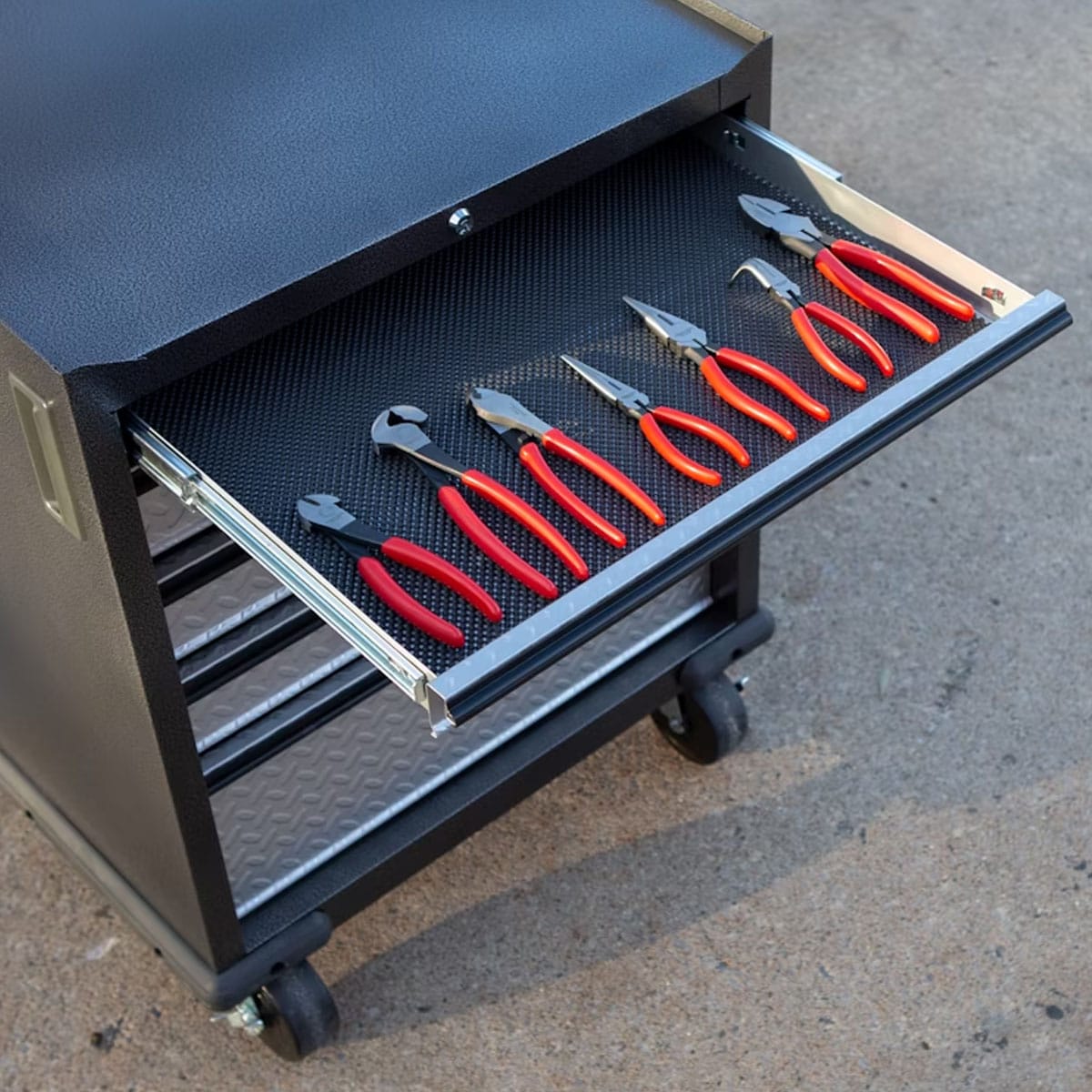 High-end tool chest with polished chrome finish displayed in modern home workshop setting