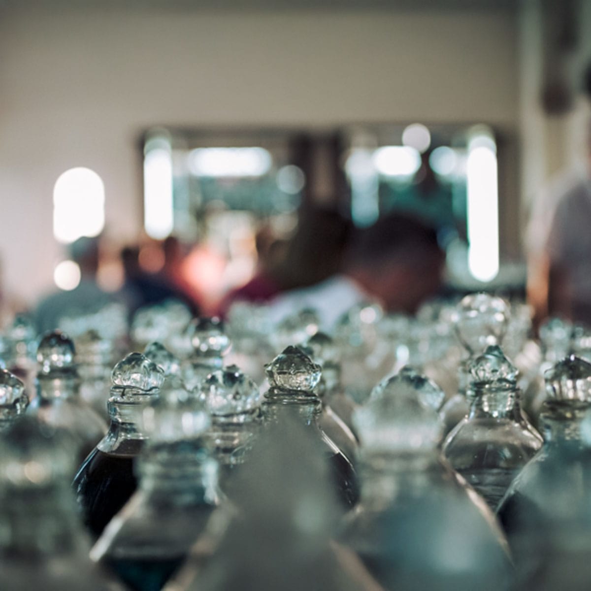 Crafting personal scent profile Perfumer creating bespoke fragrance blend tailored to individual fashion aesthetic preferences