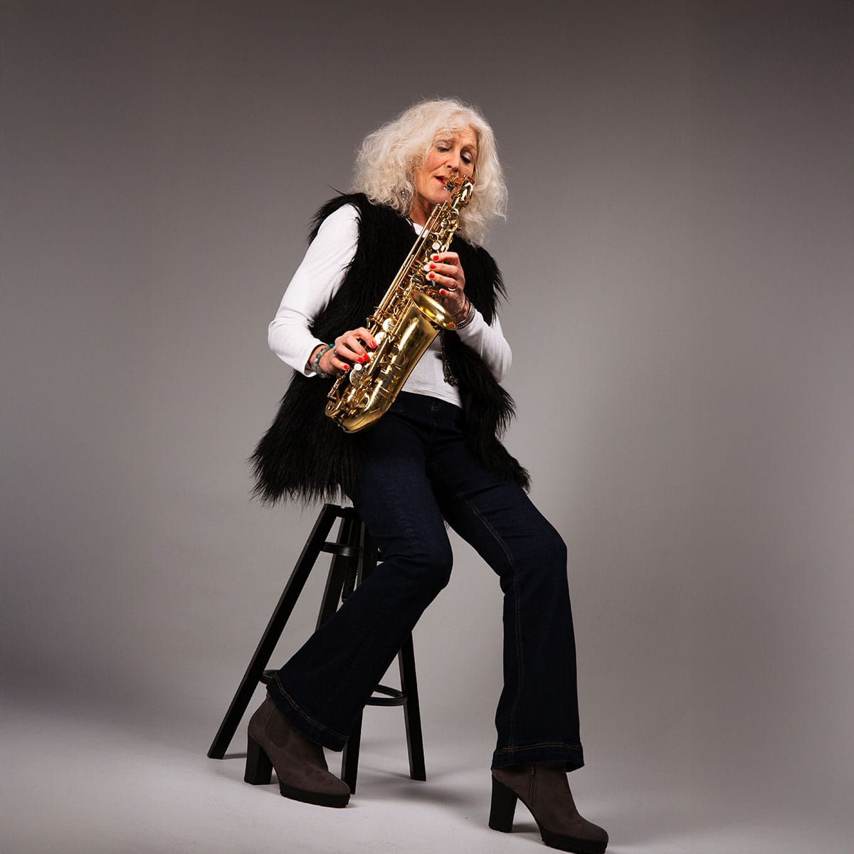 Sax diva's contemporary promotional image Anita Carmichael portrait showcasing the sax diva during her musical comeback era