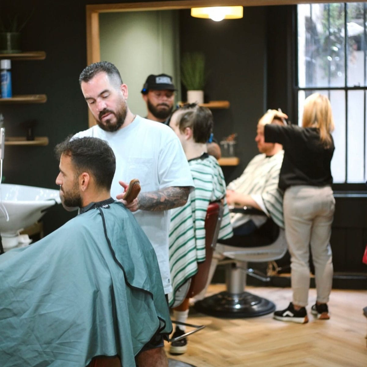 Professional barbering workspace at Fella Interior of Fella barbershop showing barber chairs and styling stations