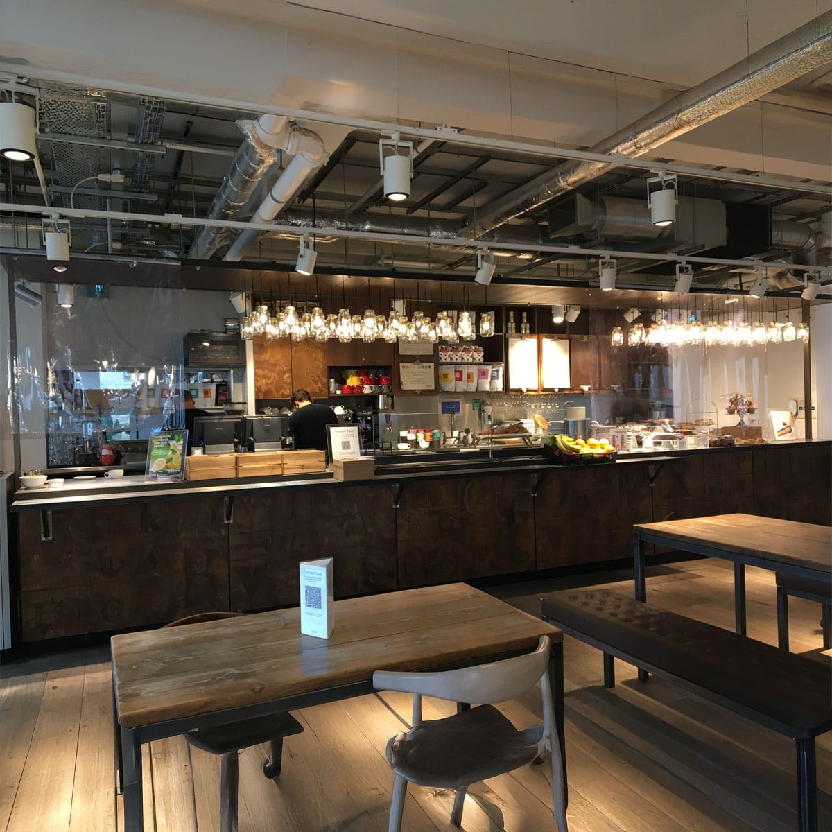 Elegant dining room at Tate Modern museum restaurant with contemporary artwork displayed