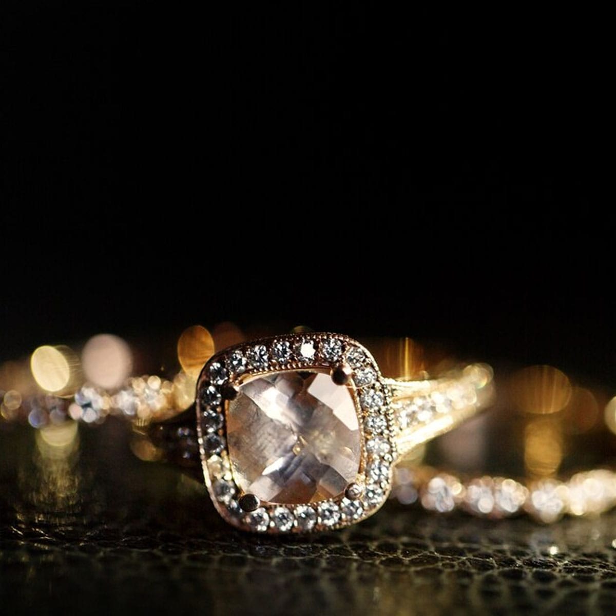 Elegant one carat diamond engagement ring worn on hand in Soho setting