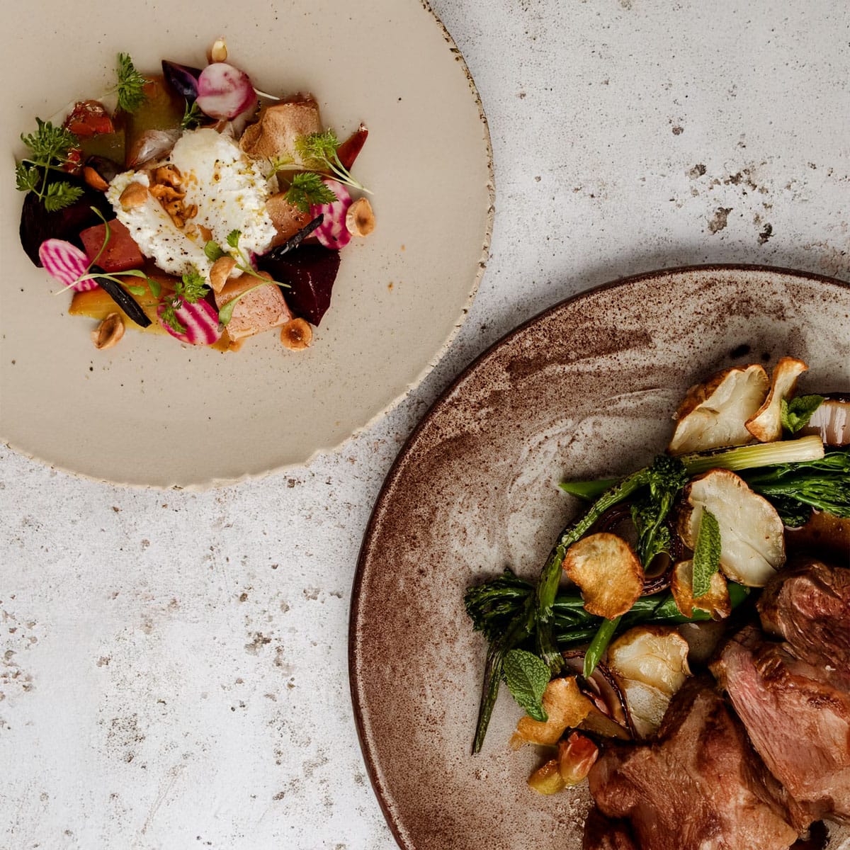 Celebrity chef demonstrating cooking technique or plating dish for social media content