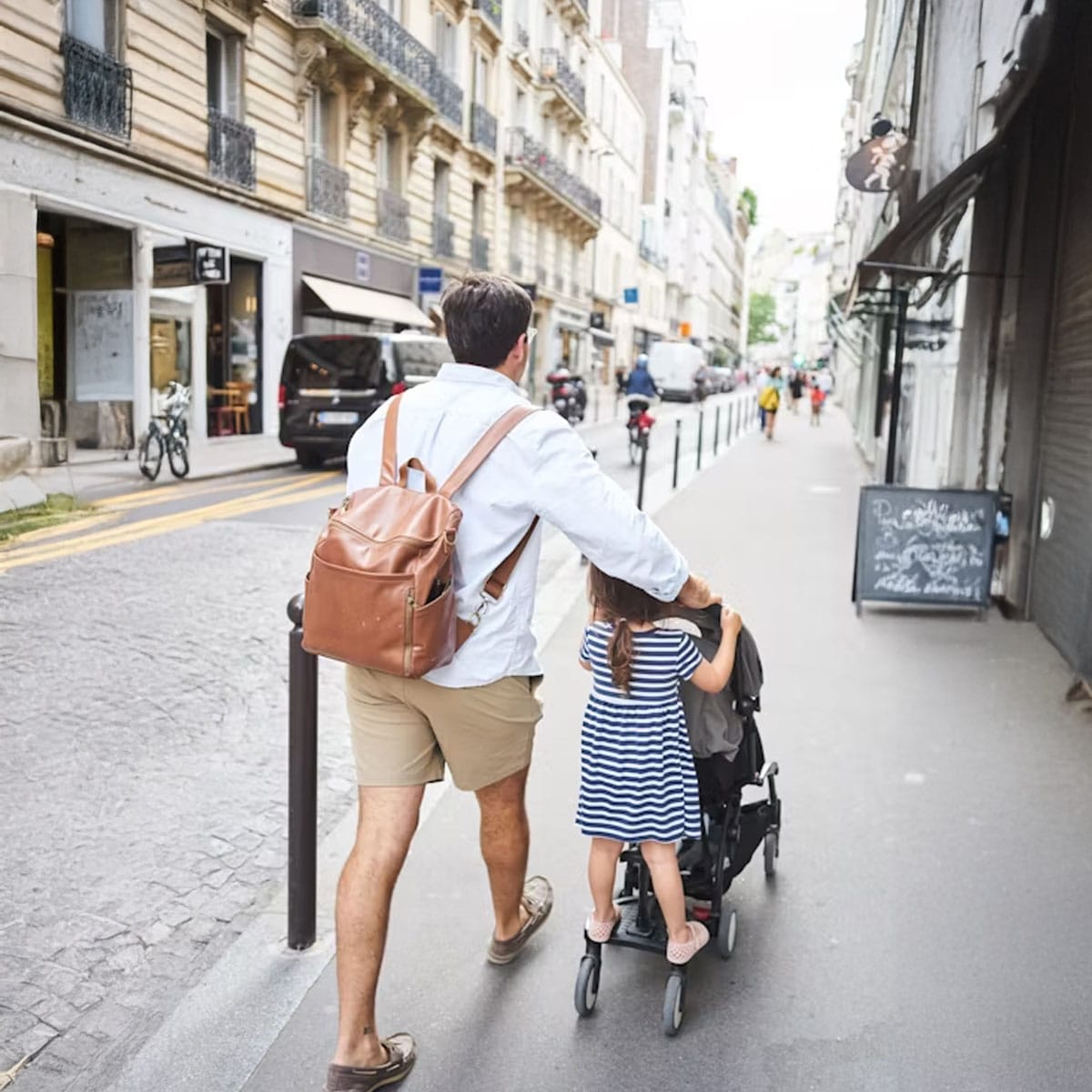Parent preparing essentials and packing items for a family day out in Soho