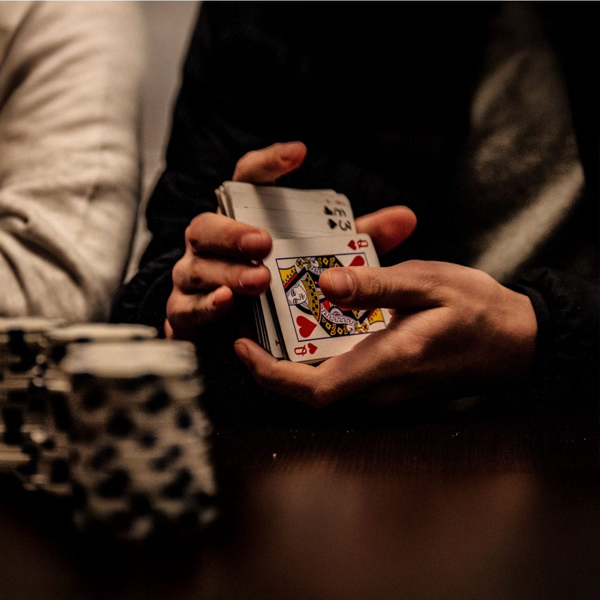 Live dealer casino experience Professional live dealer hosting online casino game with multiple players visible on screen