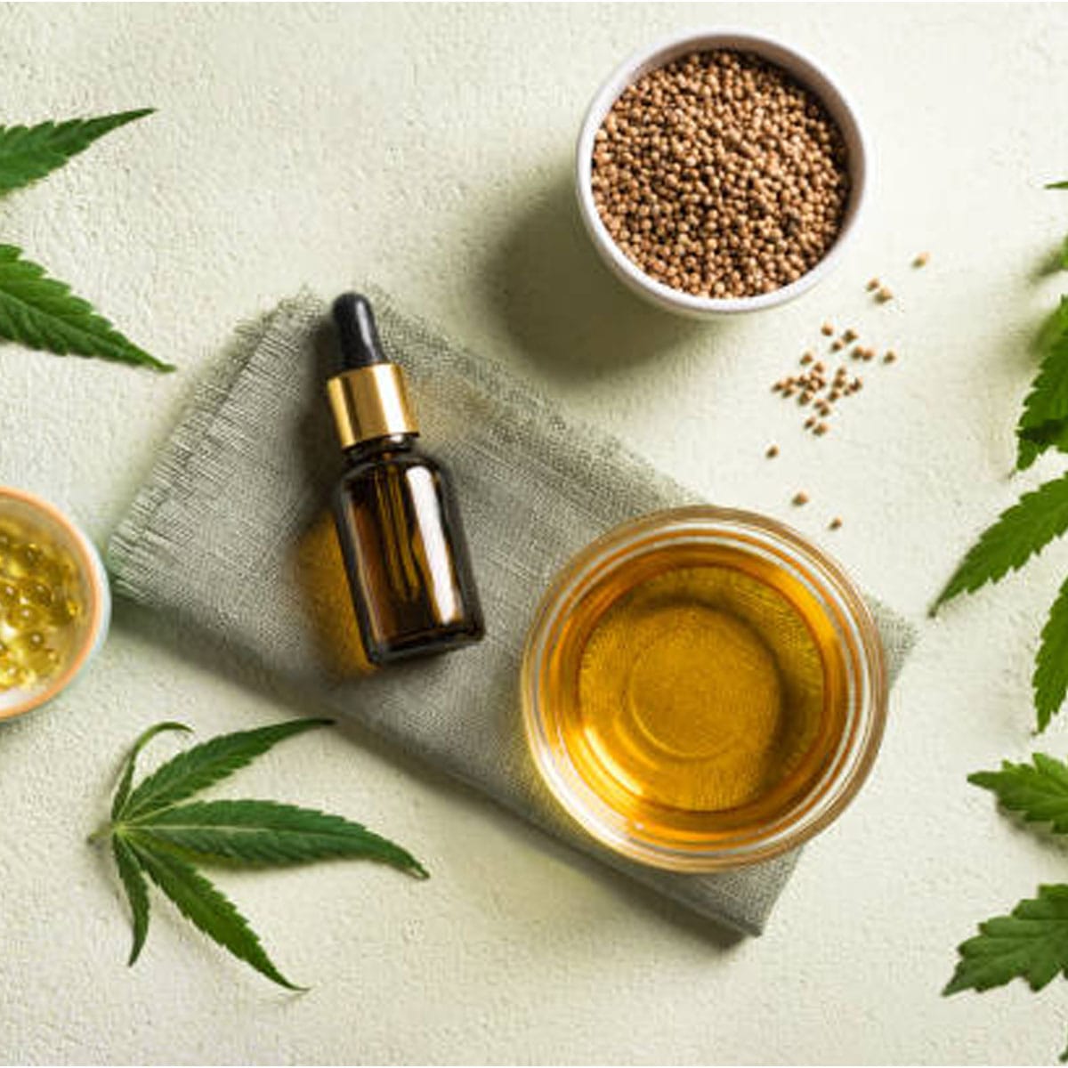 CBD oil bottle and skincare products displayed in contemporary wellness shop