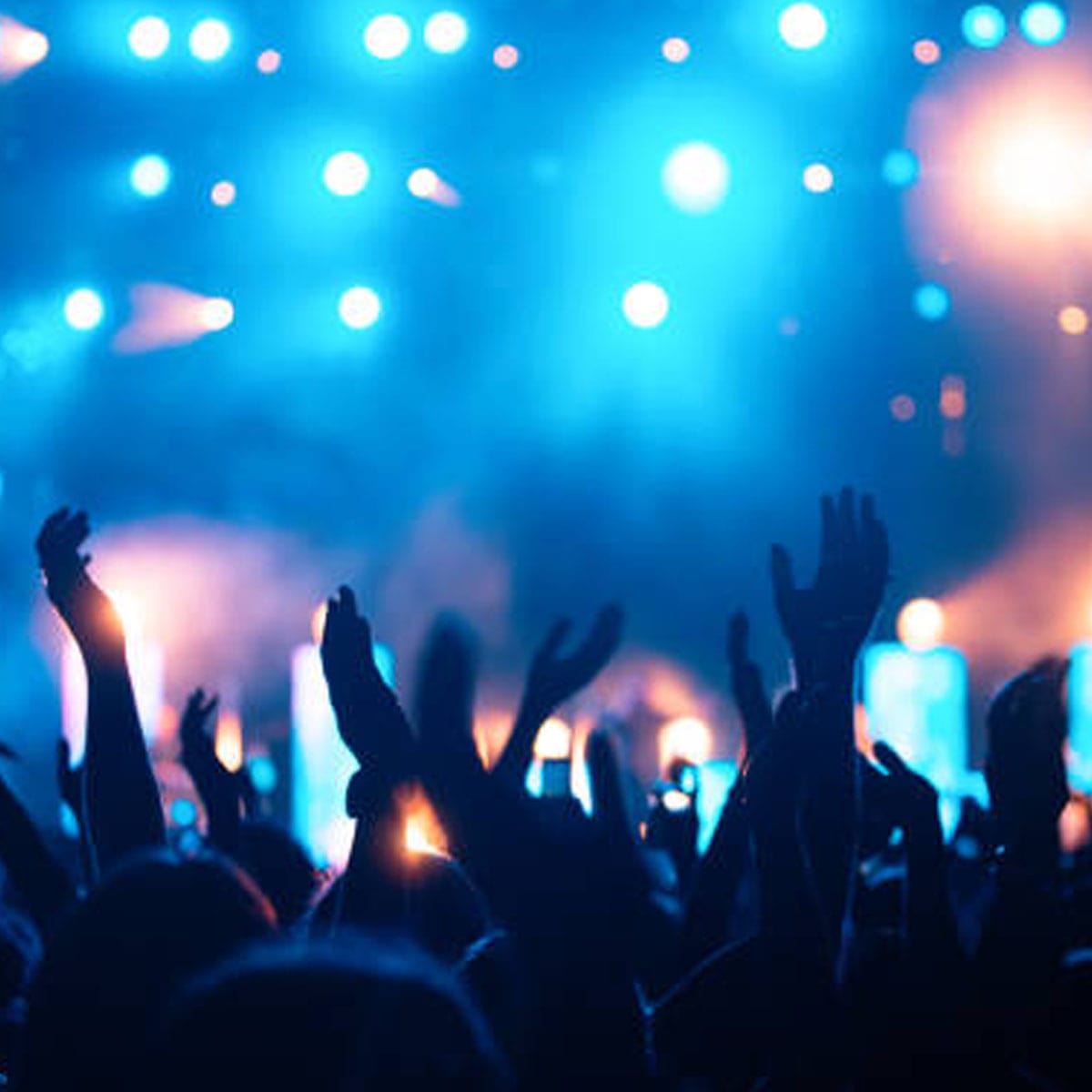 Soho nightlife atmosphere Vibrant London nightlife venue with colourful lighting and diverse crowd enjoying music