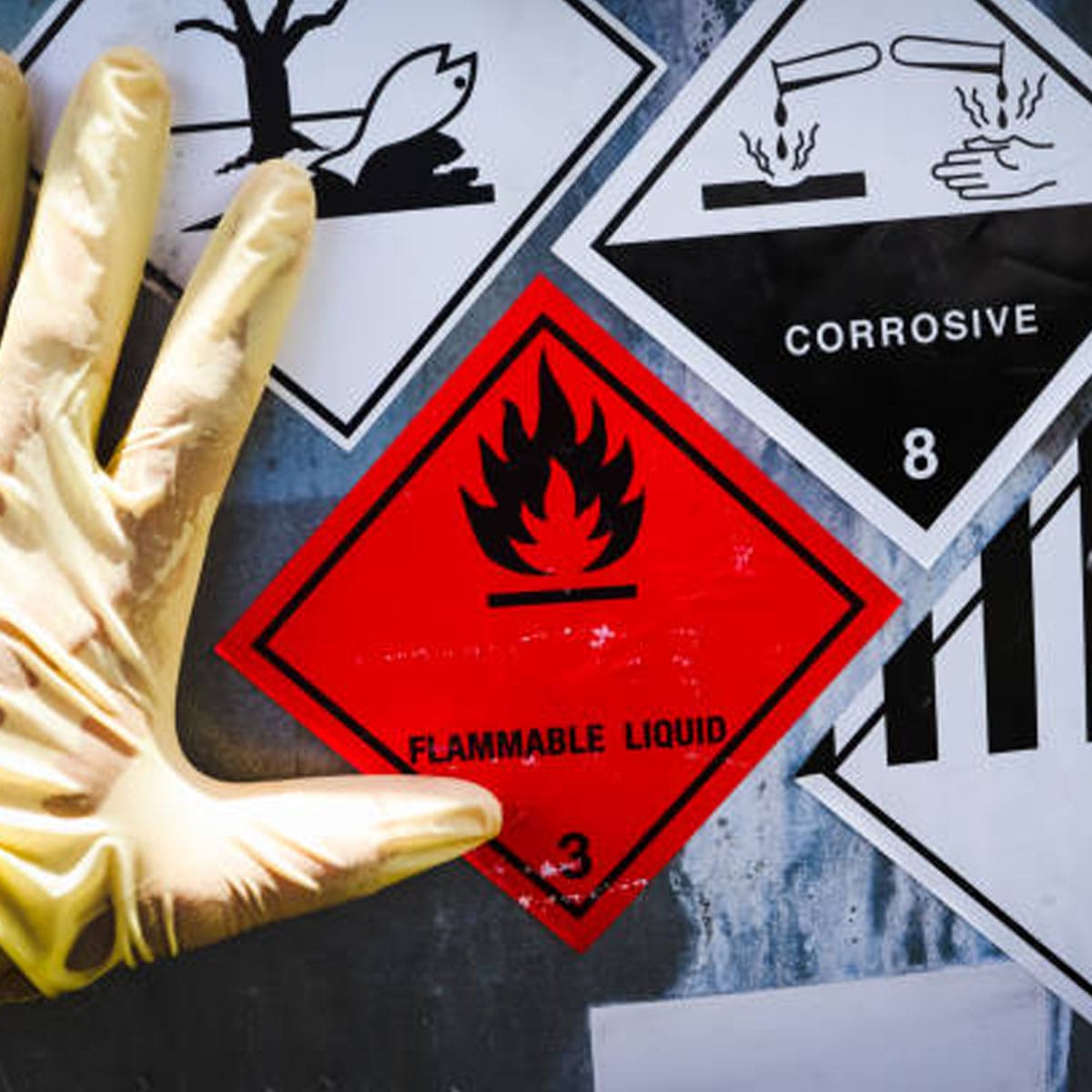 Wet floor with caution sign warning of slip hazard in workplace
