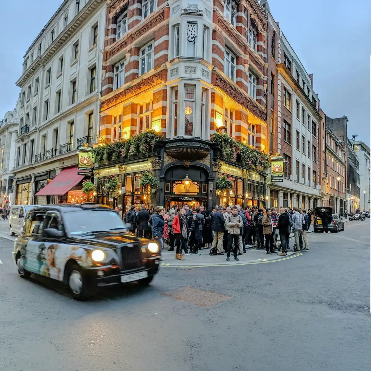 Innovation in Soho's creative space Soho's vibrant street scene showcasing creative entrepreneurs and technology enhancing artistic outputs