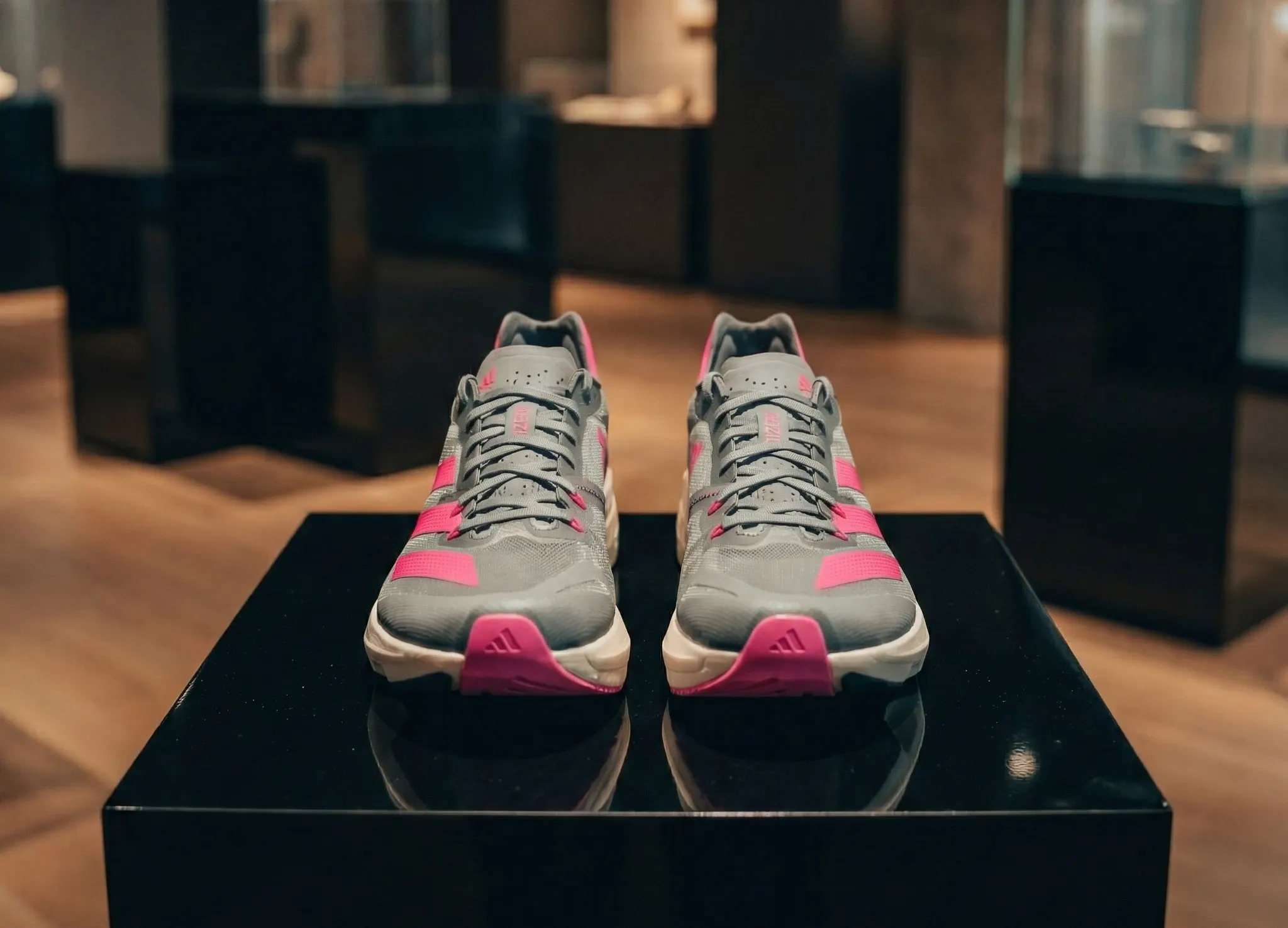 Premium athletic shoe example Adidas Adizero trainers showing branding and design elements for verification