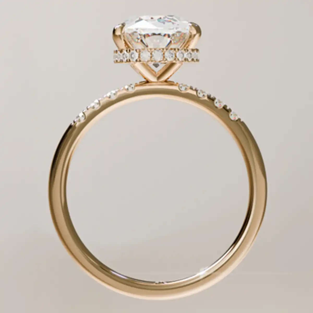 Halo setting style Sophisticated halo engagement ring with central diamond surrounded by smaller stones