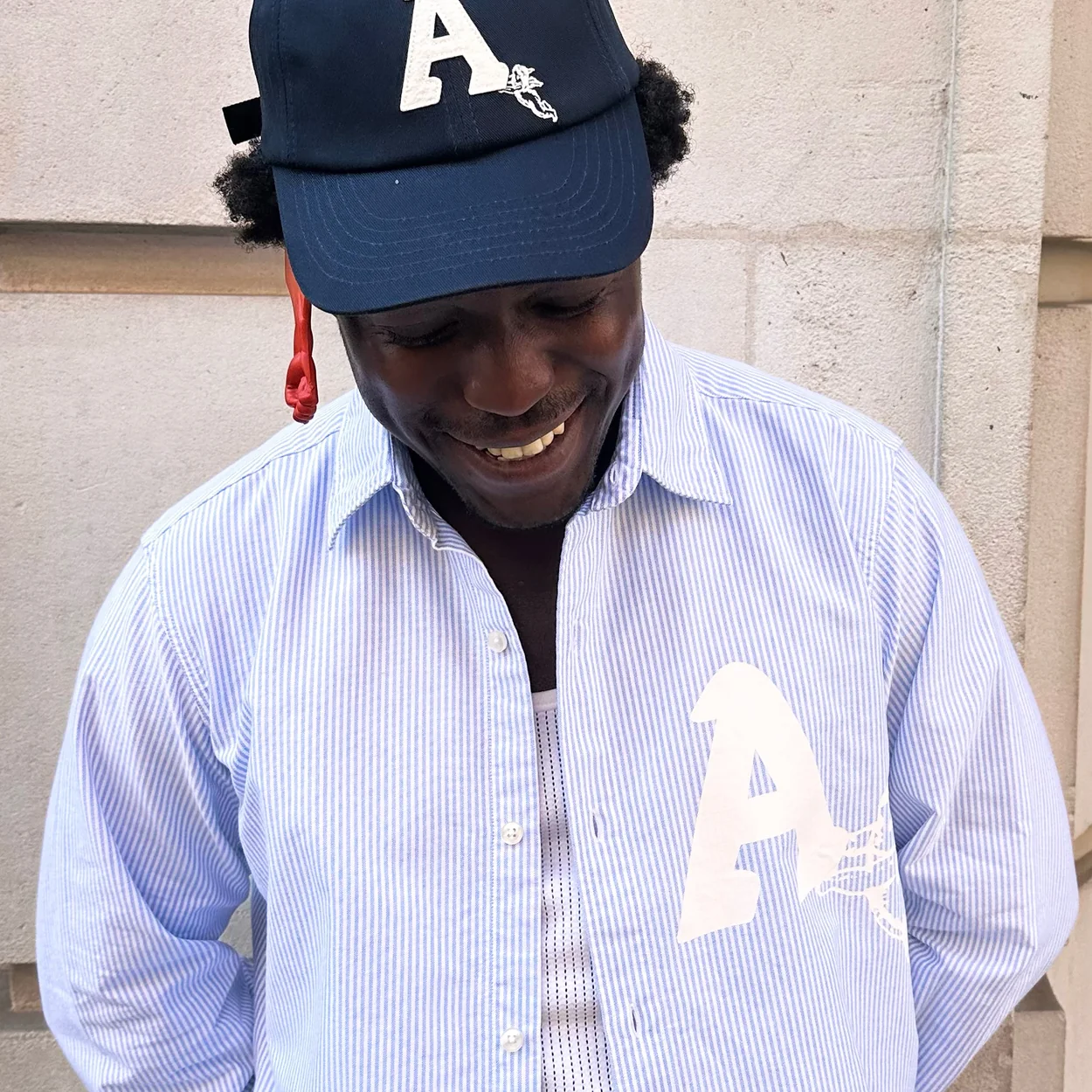 Aries A-logo cap worn with a striped shirt from the label's Great Pulteney Street flagship