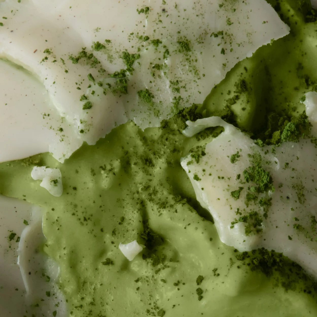 Close-up of matcha soft serve dusted with green tea powder at Blank Street Coffee