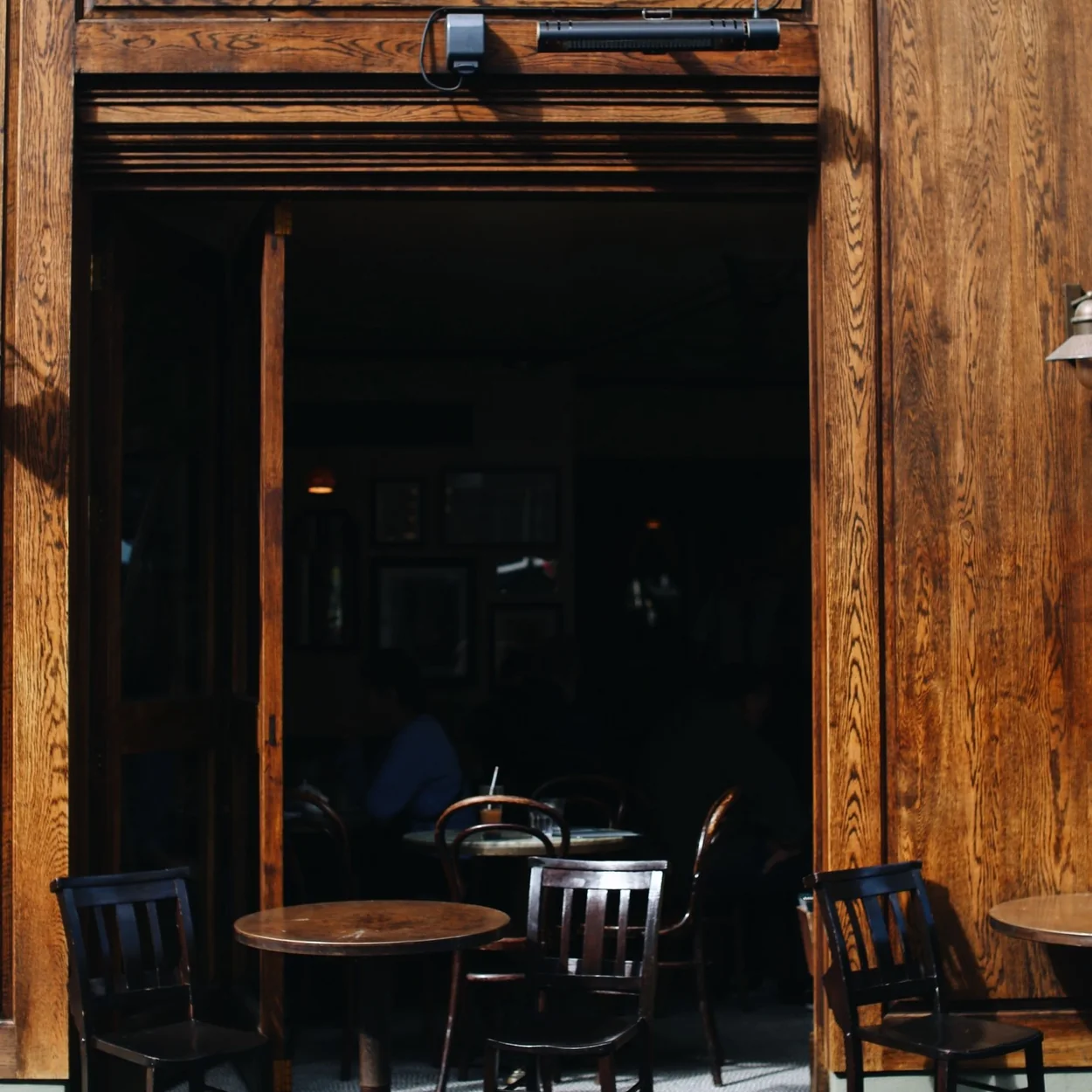 Open doors of Cafe Boheme, the French bistro on Old Compton Street in Soho