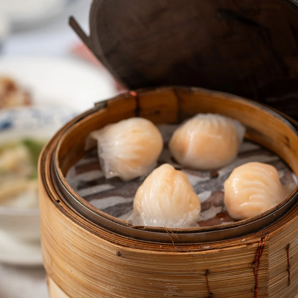 Har gow prawn dumplings in a bamboo steamer at New Young Cheng