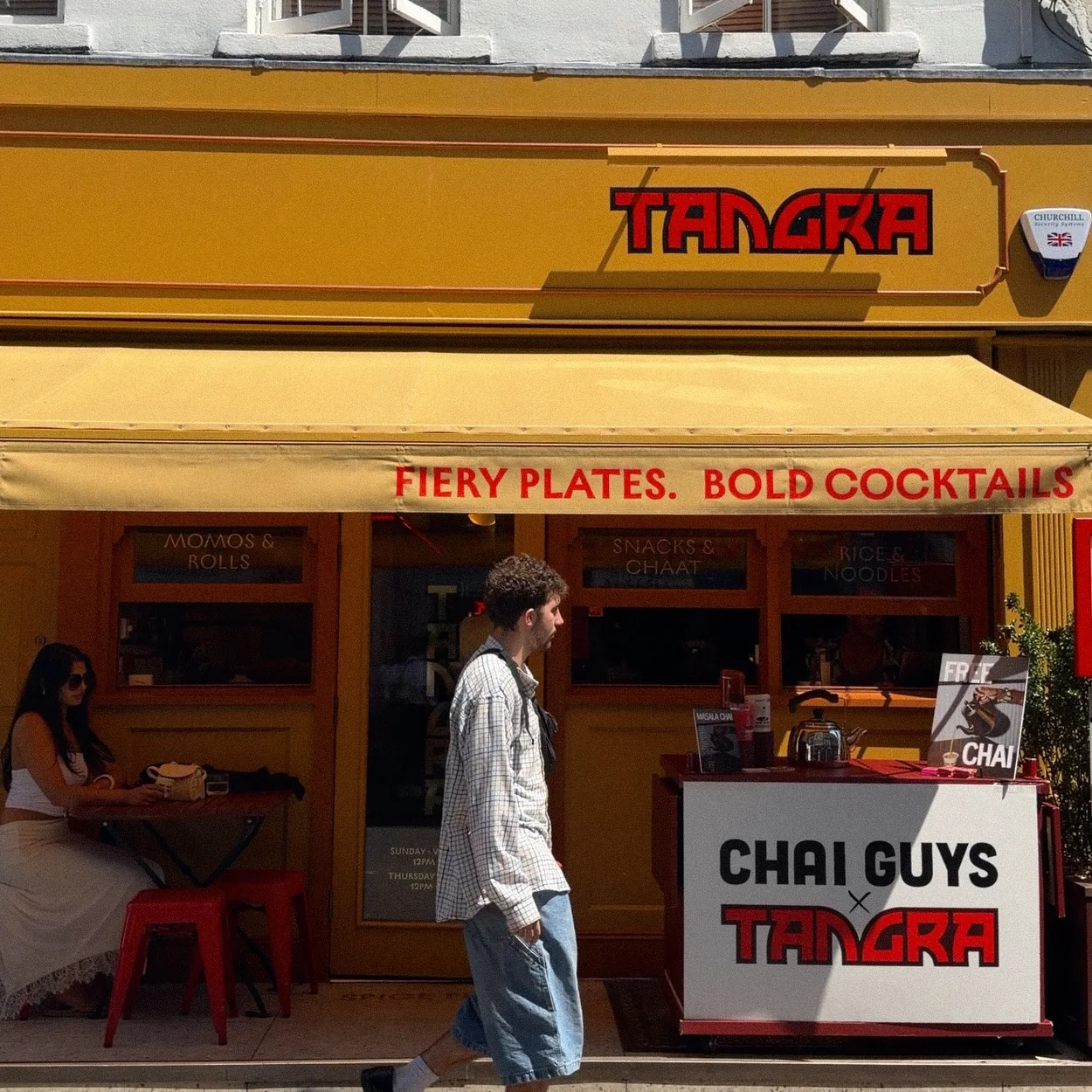 Tangra's yellow shopfront on Frith Street promising fiery plates and bold cocktails