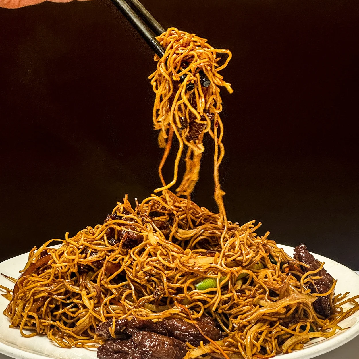 Soy sauce noodles lifted from the plate at Tao Tao Ju, Chinatown London