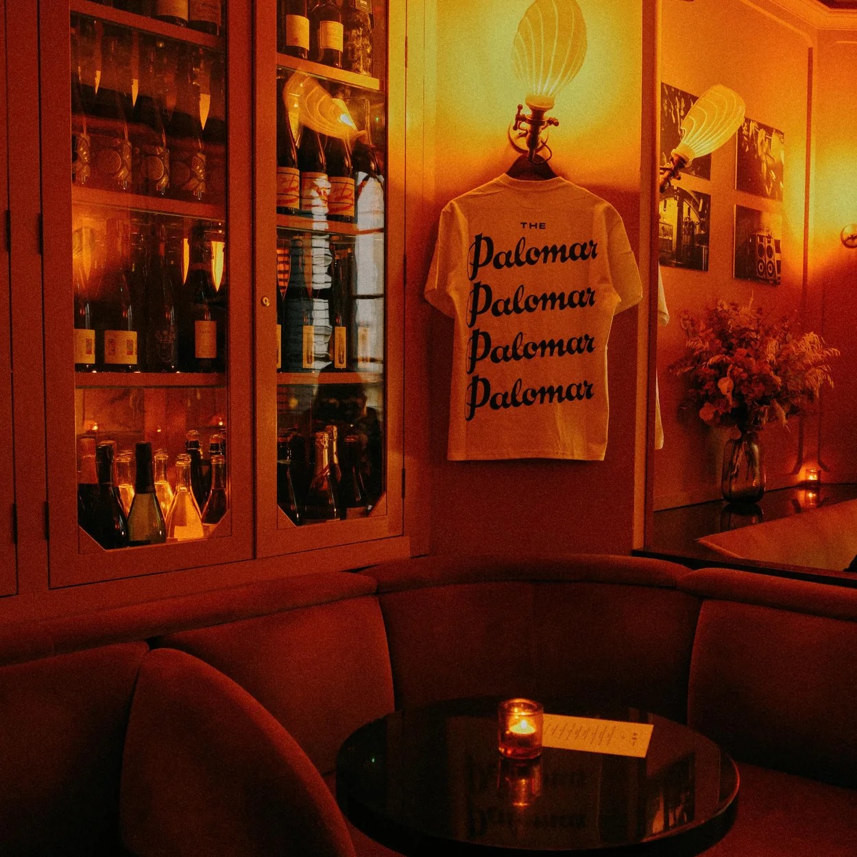 Warm lamplit corner with velvet seating inside The Blue Posts on Rupert Street