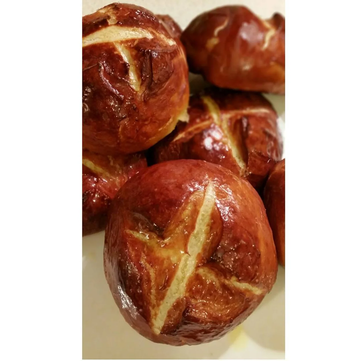Glazed pretzel buns fresh from the oven at Wonderful Patisserie